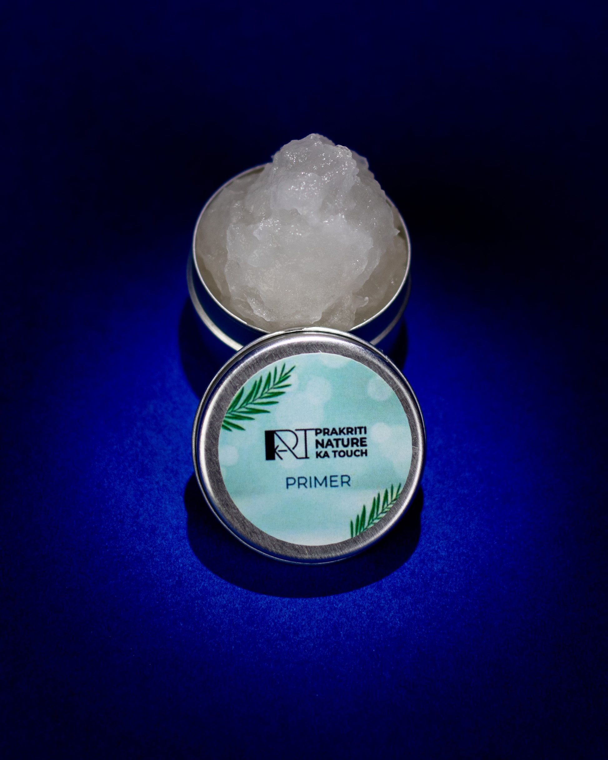 PNKT Natural Face Primer - Product packaging with aloe vera on blue background - Pore-smoothing makeup base