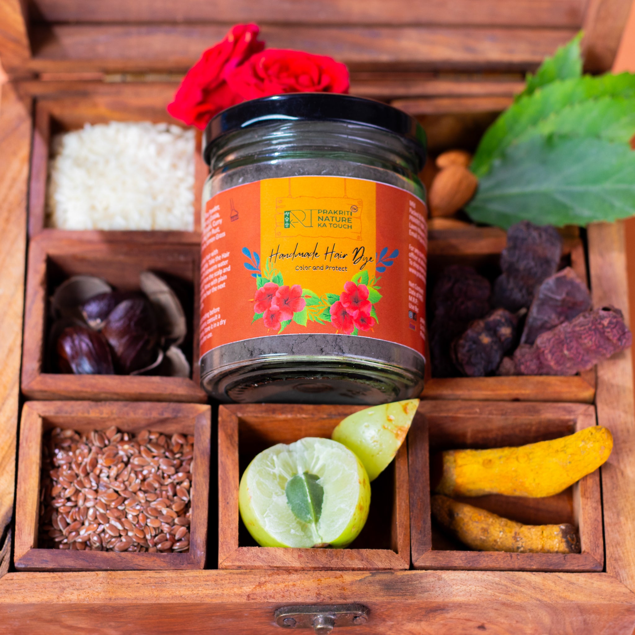 PNKT Natural Hair Dye - Packaging showing 100gm ammonia-free Ayurvedic black hair color powder