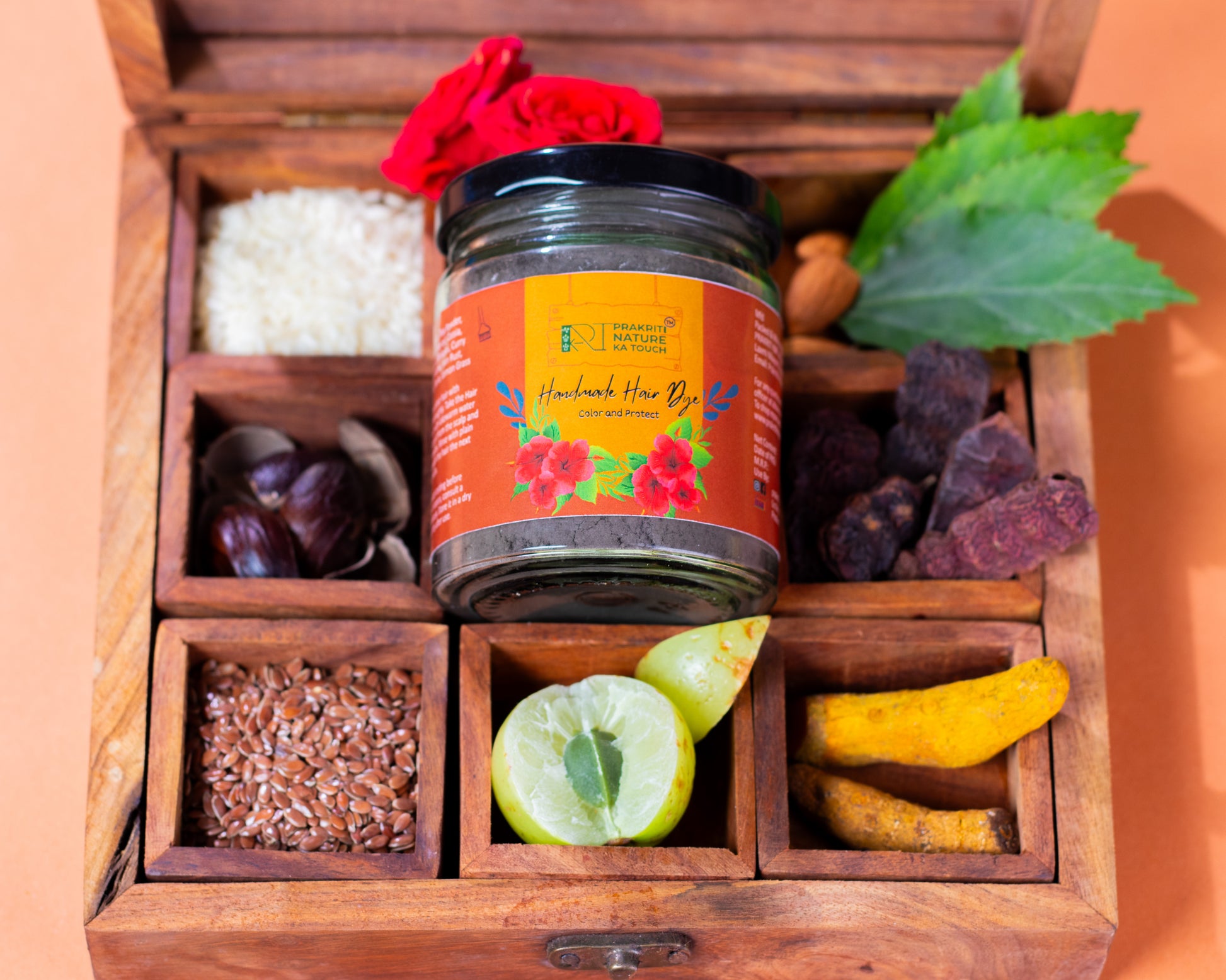 PNKT Natural Hair Dye - Packaging showing 100gm ammonia-free Ayurvedic black hair color powder