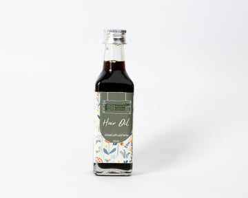 PNKT Natural Hair Oil - 100ml bottle on white background - Ancient Vedic formula for hair growth