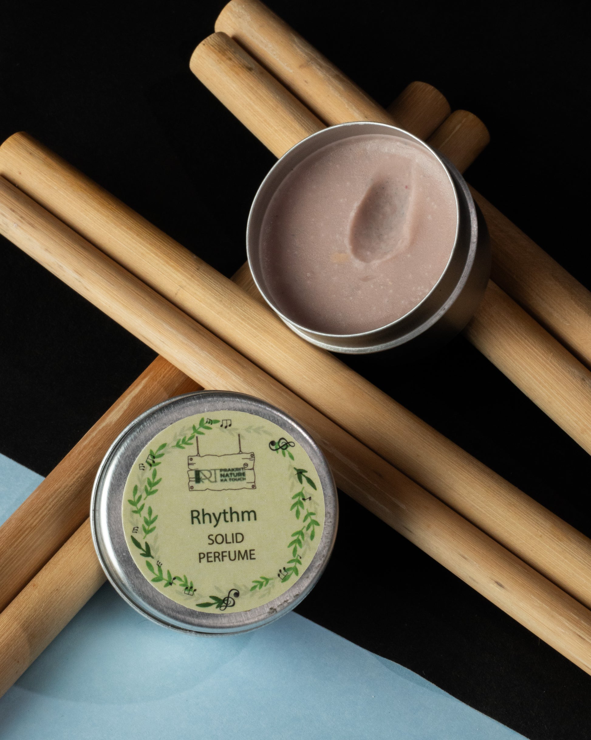 PNKT Natural Solid Perfume - Rythm scent variant with artistic elements in background - Unique aromatic blend