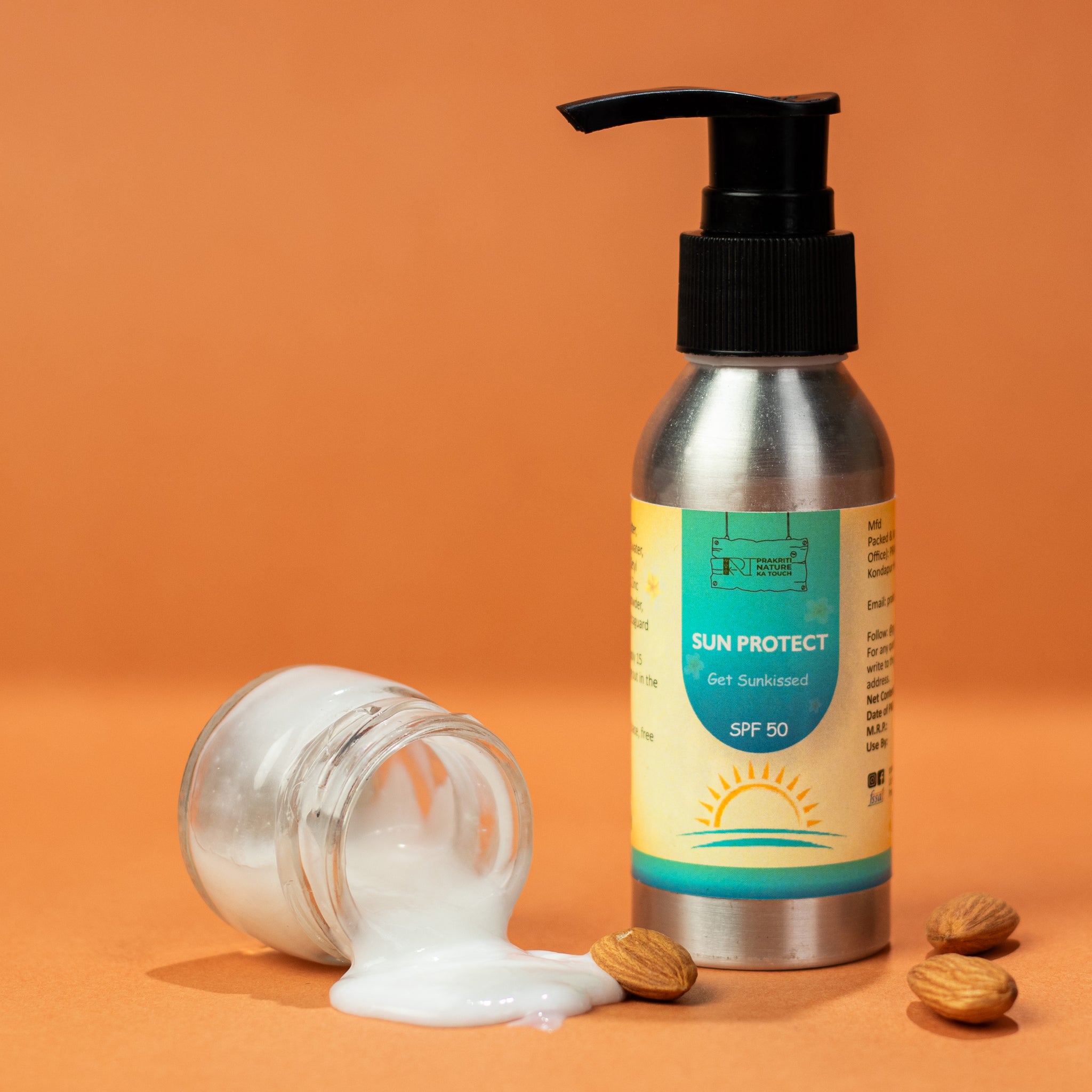 
PNKT Natural Sunscreen Cream - SPF 50 tube on orange background - Broad spectrum UV protection