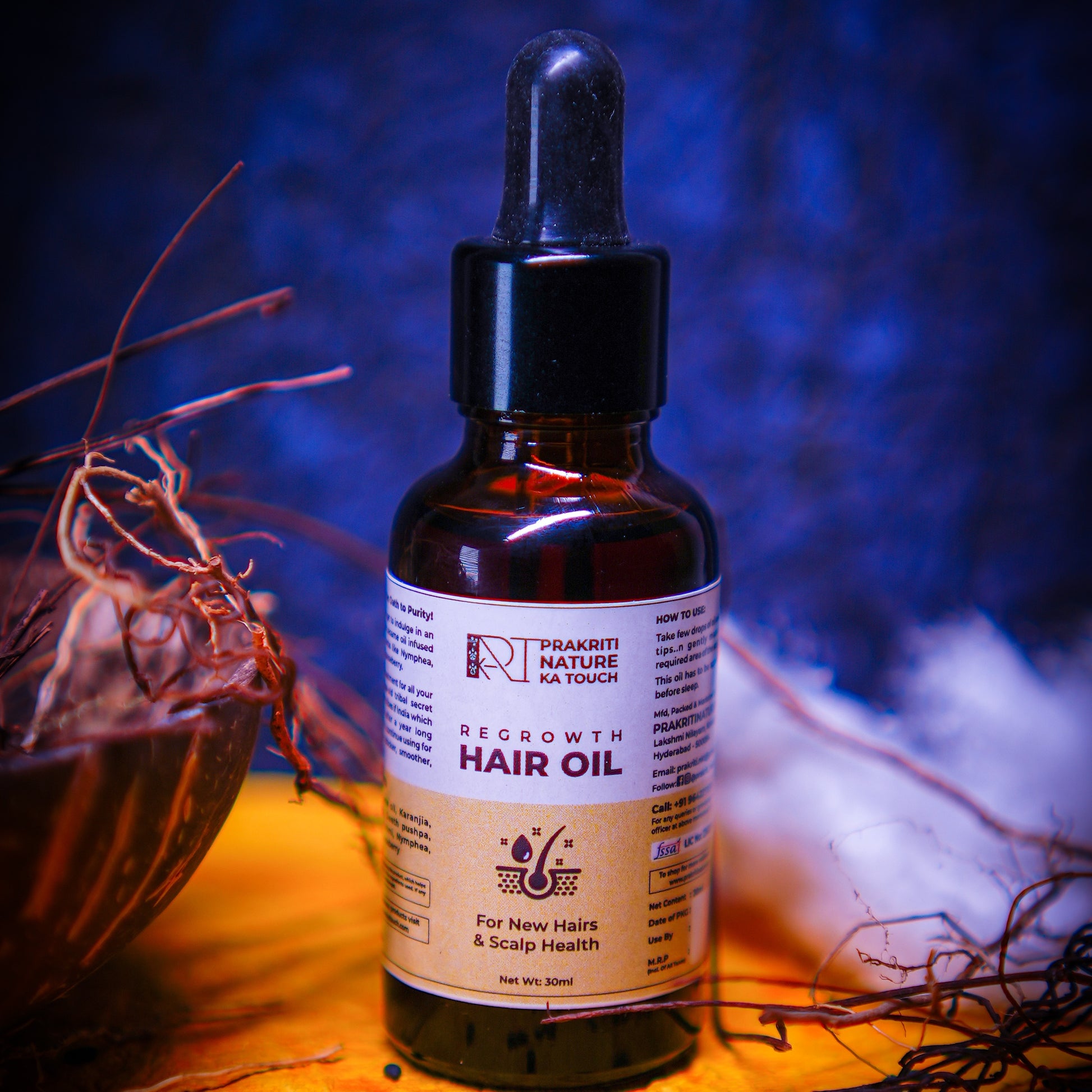 PNKT Hair Regrowth Oil - Close-up of golden herbal oil texture with 32 herbs blend - Lightweight and non-greasy